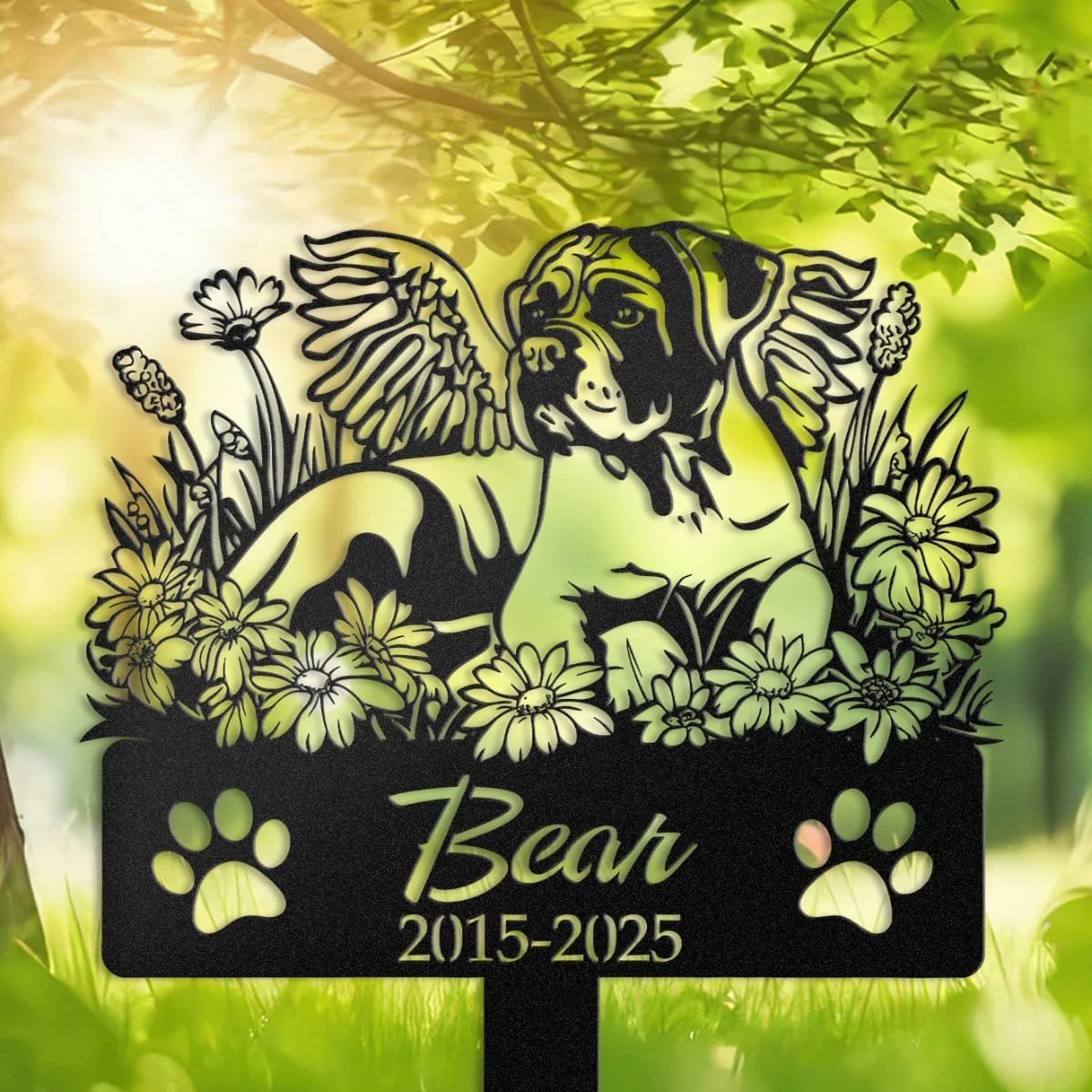 Personalized pet memorial grave marker surrounded by daisy flowers, the centerpiece of a pet memorial garden