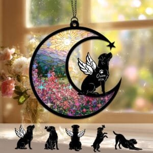 Crescent moon suncatcher with an angel-winged Rottweiler silhouette looking up at a shooting star over a stained-glass wildflower field