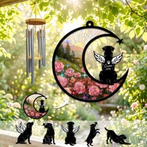 Stained-glass memorial wind chime suncatcher showing a Rottweiler silhouette with angel wings sitting on a crescent moon over pink carnations