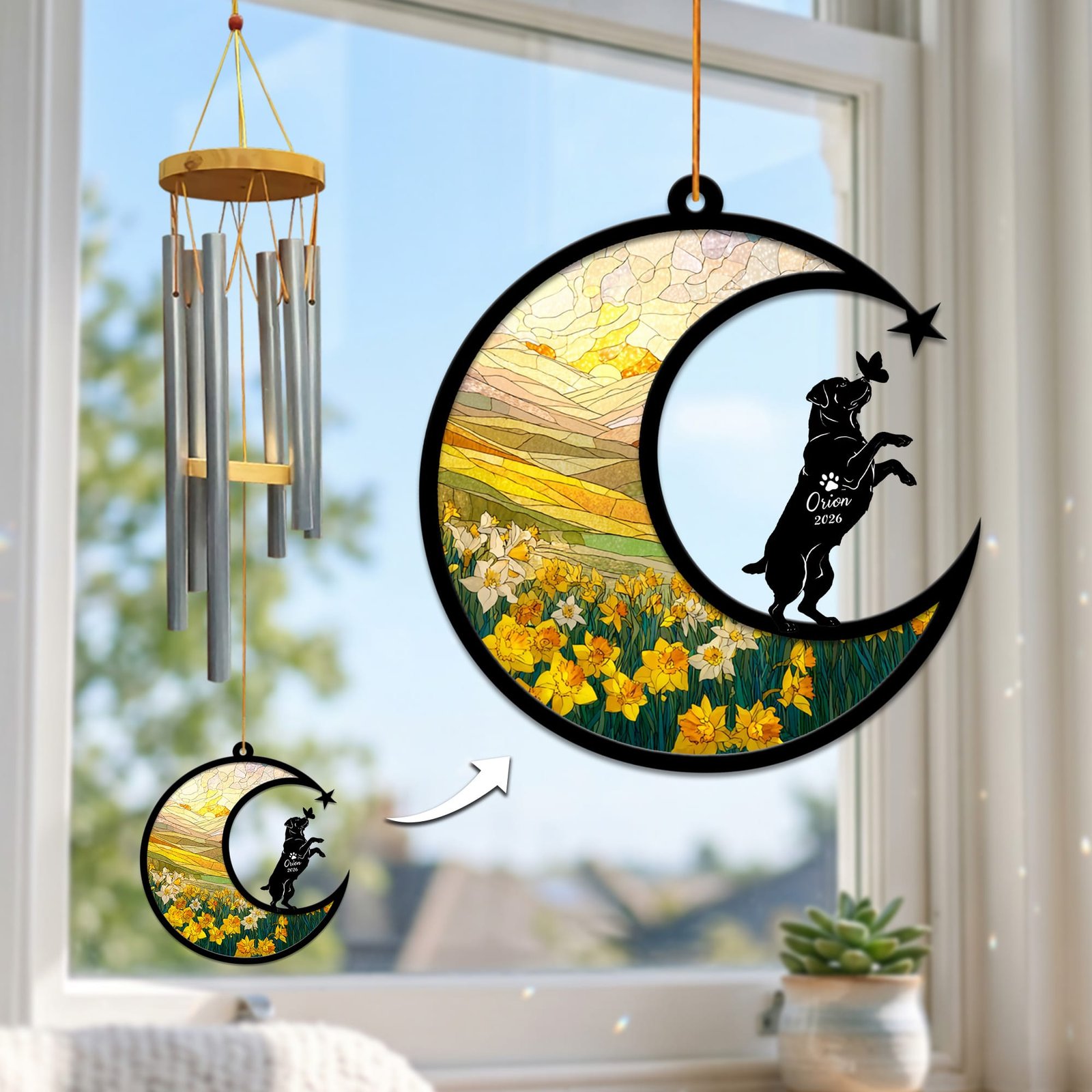 Stained-glass memorial wind chime suncatcher showing a Rottweiler silhouette standing on its hind legs reaching for a butterfly over a daffodil field, hanging in a sunny window