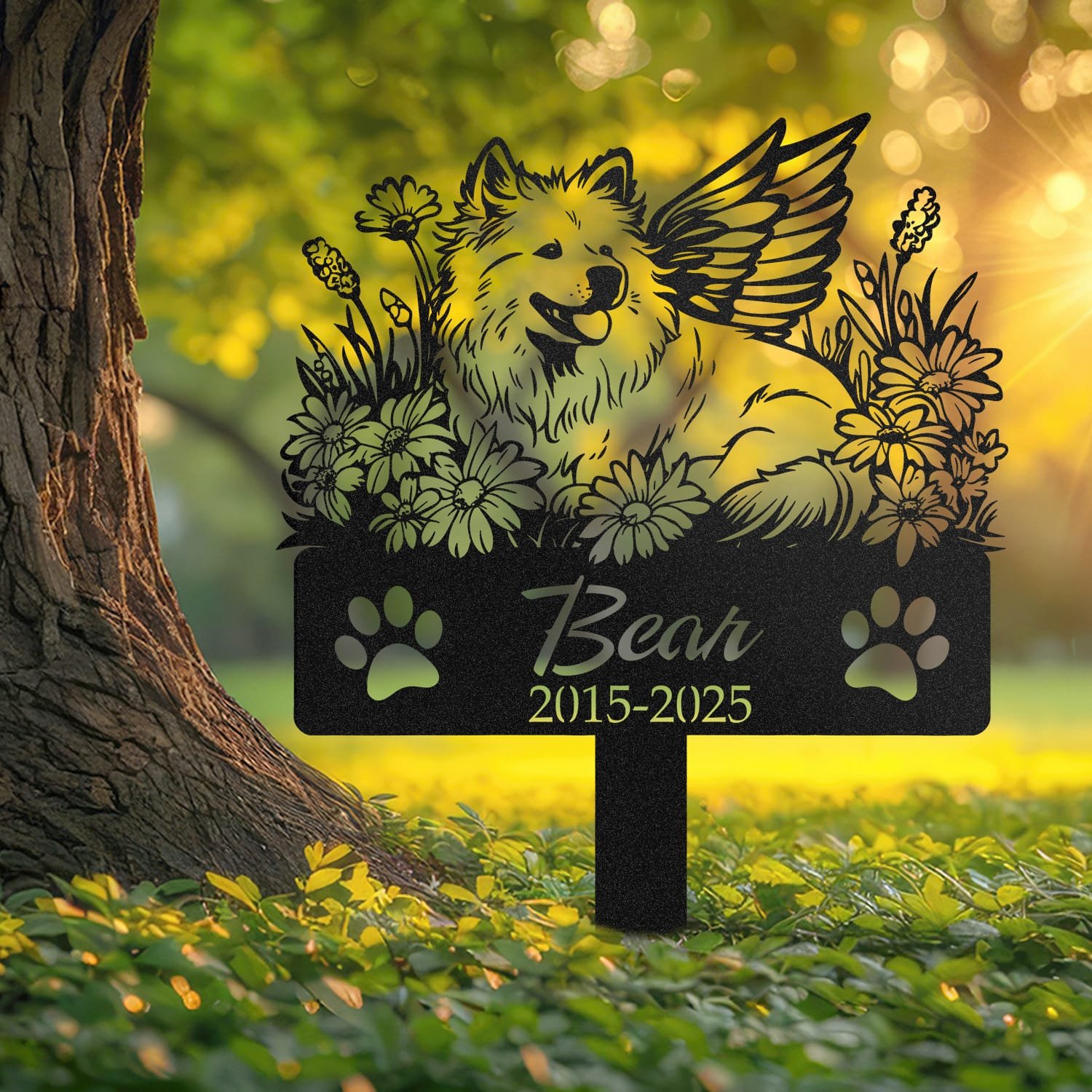 Samoyed pet grave marker displayed outdoors in a garden setting, showing the personalized angel wings and daisy floral design in place on the stake.