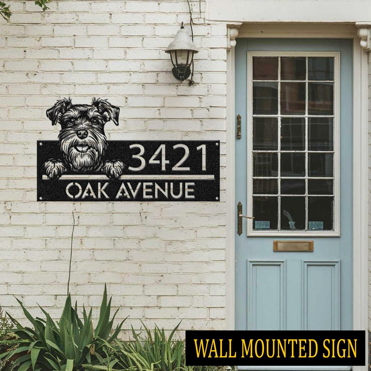 Schnauzer address sign attached flush to a brick wall