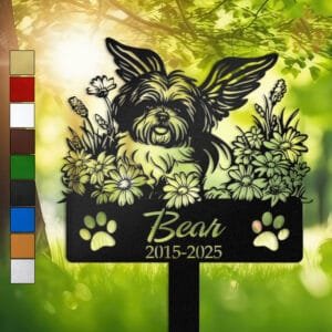 Shih Tzu silhouette with angel wings surrounded by a daisy floral border on a personalized metal garden stake, with paw print cutouts at the base.