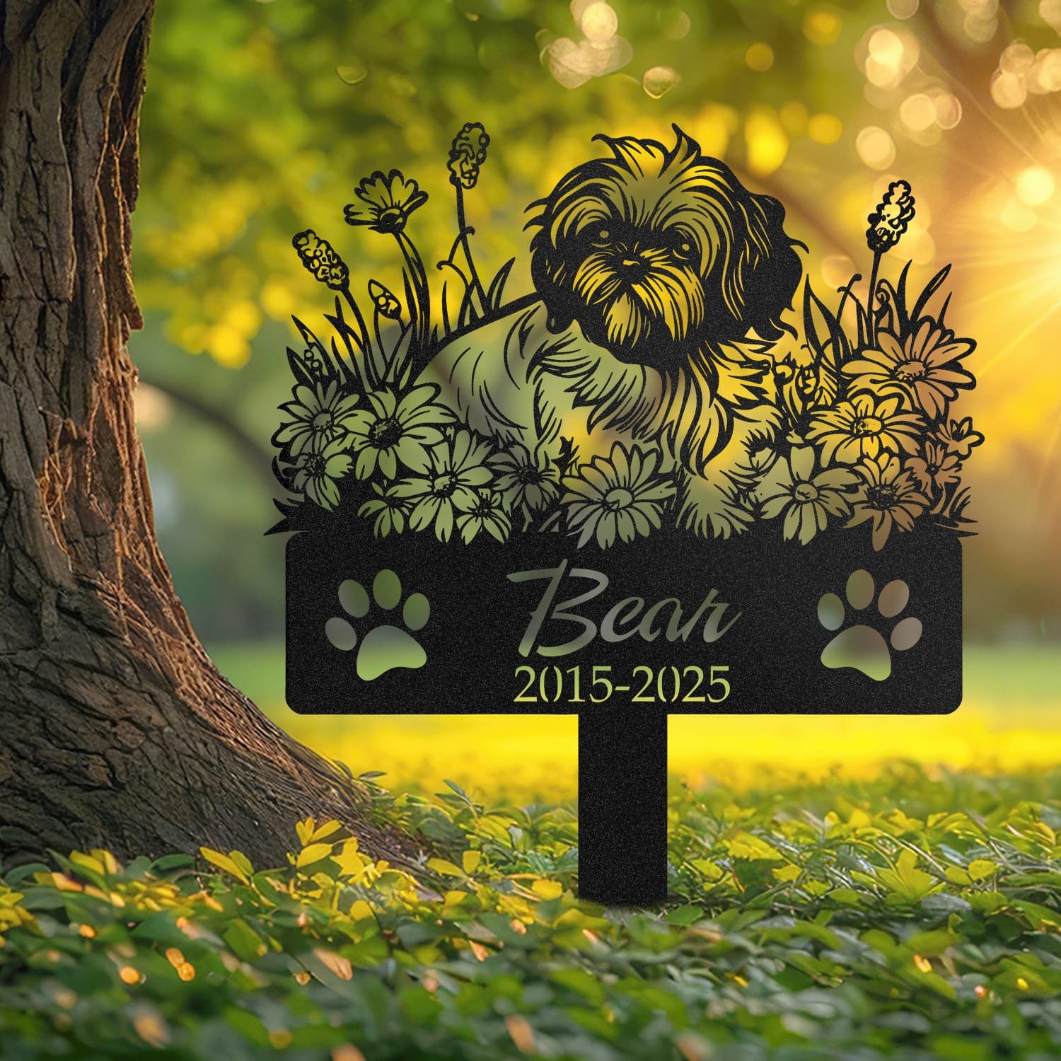 Shih Tzu pet grave marker displayed outdoors in a garden setting, showing the personalized sleeping-pose daisy floral design in place on the stake.