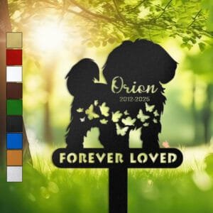 Two Shih Tzu silhouettes side by side with a trail of butterflies and a 'Forever Loved' engraving on a personalized metal garden stake.