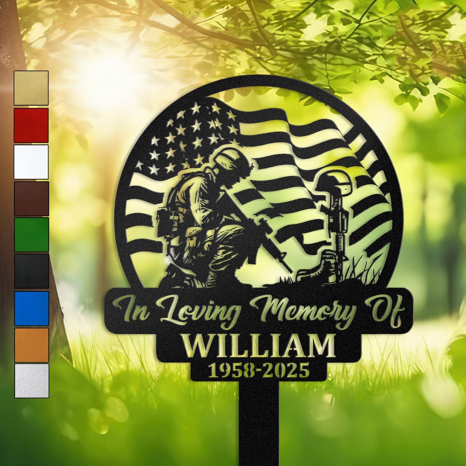 Metal memorial design of a soldier kneeling beside a battlefield cross of boots, helmet, and rifle, framed by a waving American flag, set within a circular medallion frame and engraved with 'In Loving Memory Of', personalized with a name and memorial years.