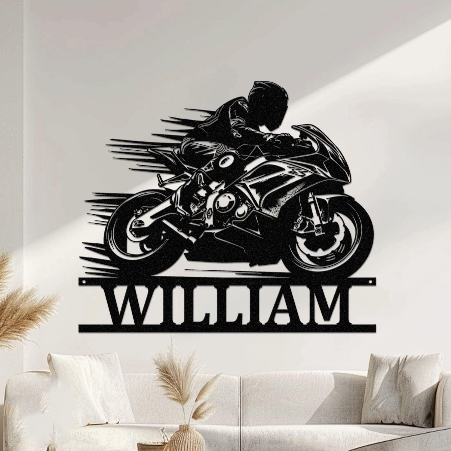 Rider leaning into a high-speed turn on a sport motorcycle with motion lines, and a custom name cut into the base of a personalized metal wall sign.