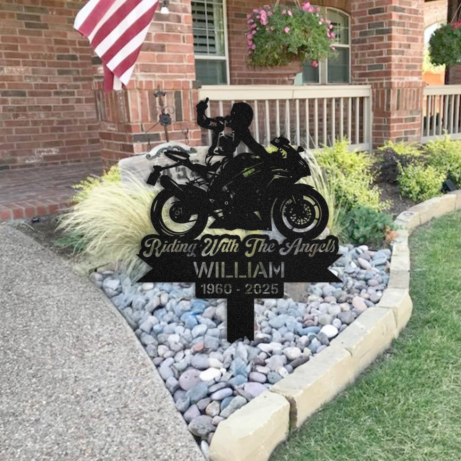Sport Motorcycle human grave marker staged near a home entryway, showing the finished sport motorcycle rider silhouette design and name plate outdoors.