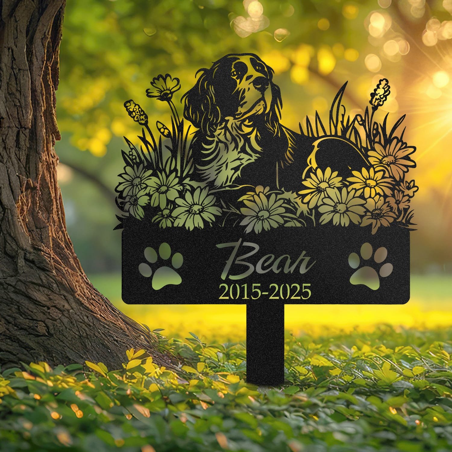 Springer Spaniel pet grave marker displayed outdoors in a garden setting, showing the personalized sleeping-pose daisy floral design in place on the stake.