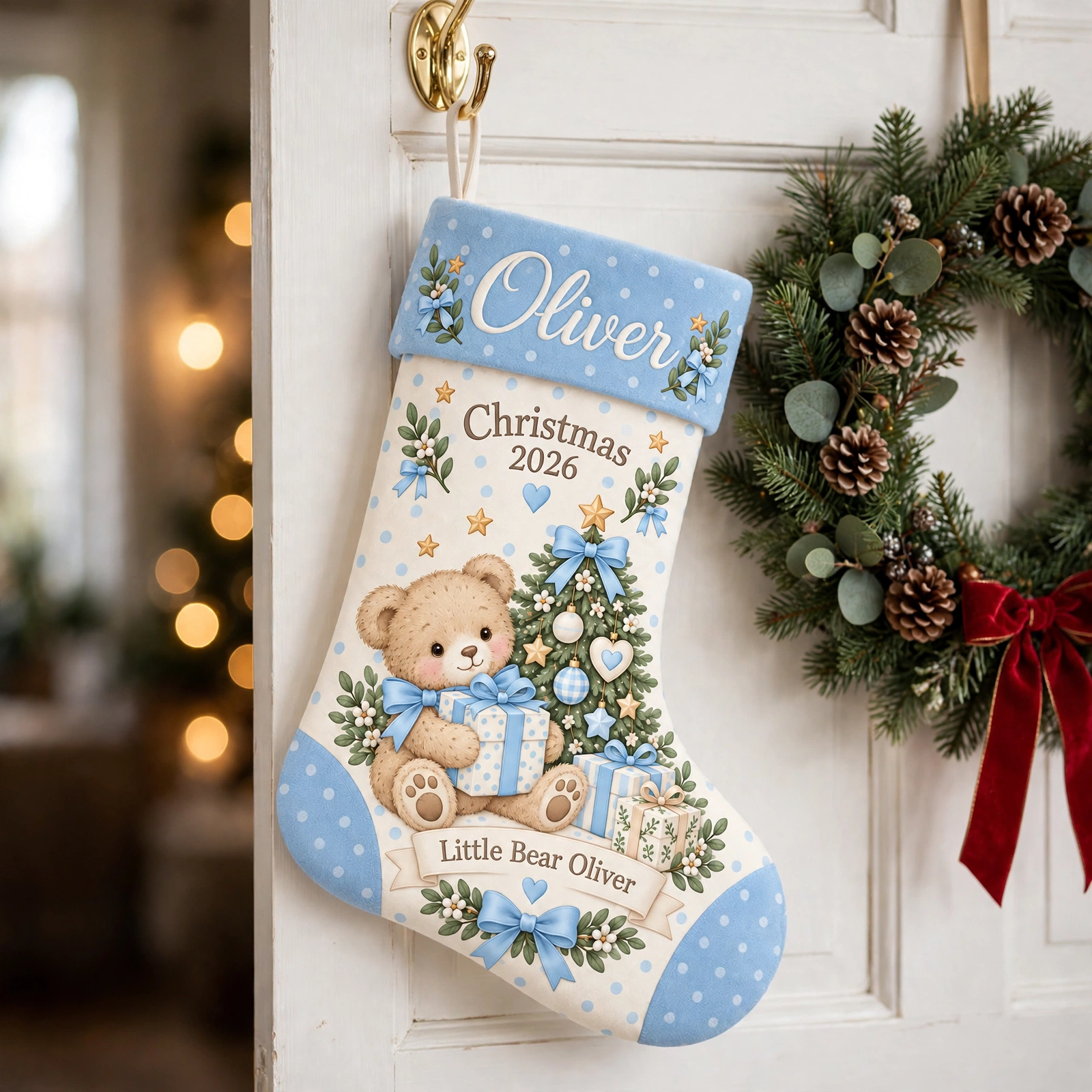 Blue Polka Dot Teddy Bear Christmas stocking hanging on a white door beside a Christmas wreath