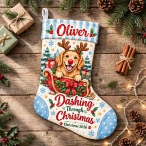 personalized blue sleigh reindeer dog stocking shown laid flat on a wooden surface beside wrapped gifts and greenery