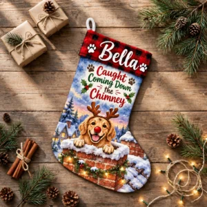 personalized snowy chimney reindeer dog stocking shown laid flat on a wooden surface beside wrapped gifts and greenery